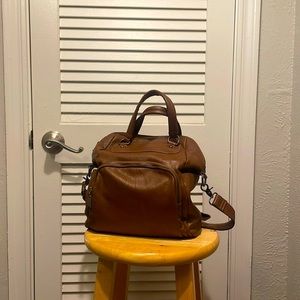 Versatile brown backpack/purse that can be styled depending on your day!